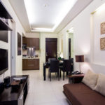 Grand Hampton Towers 1 bedroom apartment - living, tv and dining