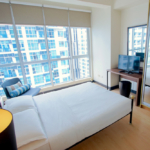 Crescent Park Residences - 2 bedroom apartment - main bedroom with tv