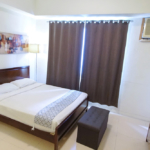 The Infinity studio apartments - bed