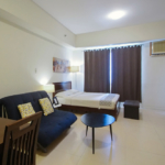 The Infinity studio apartments - living and bed