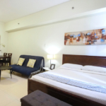 The Infinity studio apartments - living and bed