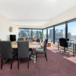 Eureka Tower apartment - living room and dining area