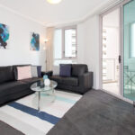 Mary St, Brisbane apartment - living room with balcony