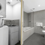 Shelley St, Sydney - apartment 407 laundry and bathroom