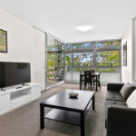 Shelley St, Sydney - apartment 407 lounge and dining area