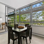 Shelley St, Sydney - apartment 407 dining area leading on to the balcony