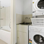 Shelley St, Sydney - apartment 403 shower and laundry