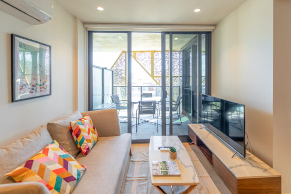 Realm apartments, Adelaide - one bedroom - living room and balcony