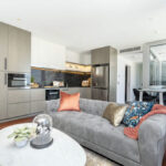 QT Apartments, Perth - apartment 1701 dining table and kitchen