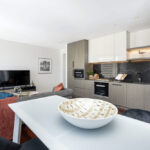 QT Apartments, Perth - apartment 1701 dining table and kitchen